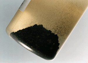 Bild 1: Wasserprobe aus einer reklamierten Anlage.