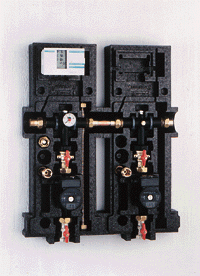 Bild 6: Pumpenbaugruppe mit Wärmedämmung und Solarregler.