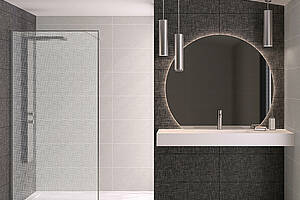 Produktserien wie „Solo Design“ bieten eine Auswahl an Gläser und Dekoren. Dazu zählen Varianten mit satinierten Bereichen in der Mitte oder vollflächig blickdichte Gläser – optional mit geprägten Strukturen oder grafischen Mustern. Die Profilfarben lassen sich auf das jeweilige Gestaltungskonzept abstimmen. Für Situationen, in denen ein offener Duschbereich nicht gewünscht ist oder der Platz begrenzt ist, bietet Kinedo bewegliche Elemente an. Die Serie „Walk-In Mobile“ umfasst Schiebe-, Schwenk- und Faltwände, die sich auch bei geringer Raumtiefe einsetzen ließen. Bild: SFA Sanibroy